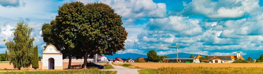 Obraz premium High resolution stitched panorama of a summer view at Aholming, Deggendorf, Bavaria, Germany