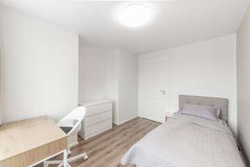 Minimalism Children, Young Adult Living Room Interior. Gray Blanket on the Bed. 