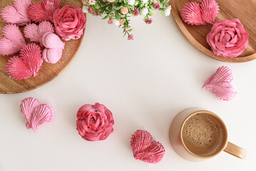 Romantic coffee flat lay with rose and heart shape marshmallow. Valentine's Day celebration. Template