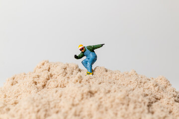 Mini Snowboarder on Sand
