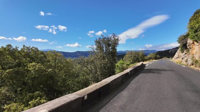 Driving through the countryside at Sournia near the amazing Gorges de Galamus, Aude, Eastern Pyrenees, Languedoc Roussillon in France.