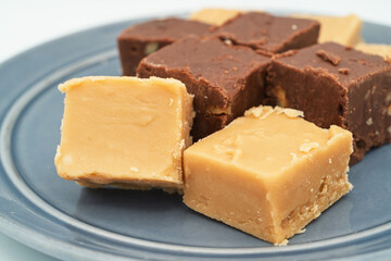 Squares of creamy homemade fudge.