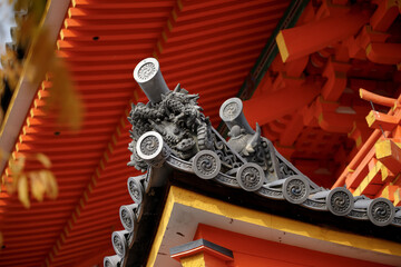 onigawara, ogre or demon tiles, temple red roof ornamentation in Japanese architecture