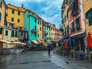 Obraz premium Dramatic colorful street in Vernazza, Italy on a cold and rainy day, capturing the streets of the world famous village.