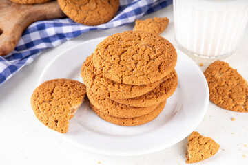 Homemade classic Gingersnap Cookies stack on kitchen table