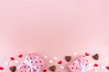 Romantic Valentine day background with hearts, gift boxes, heart-shaped chocolates. St Valentine’s day dating menu for restaurant, cafes, party invitation background copy space