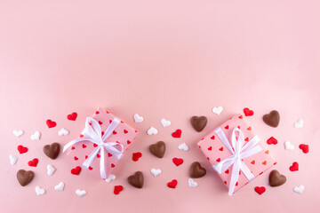 Romantic Valentine day background with hearts, gift boxes, heart-shaped chocolates. St Valentine’s day dating menu for restaurant, cafes, party invitation background copy space