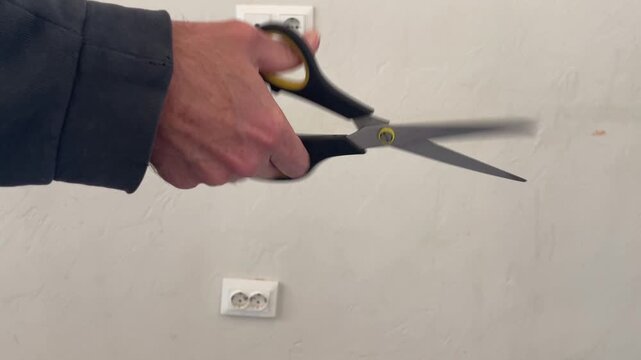 Metal blades of scissors snipping, clicking