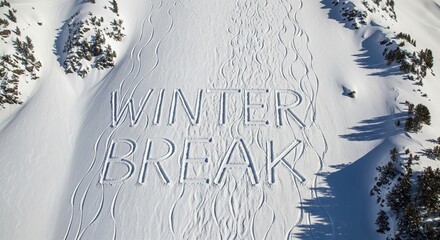 Winter Break Written in Snow by Ski Tracks Helicopter Shot