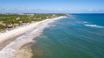 Tulum Beach, Quintana Roo, Mexico, Beach with a lot of people and a beautiful ocean. The beach is full of people and the ocean is calm