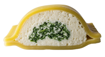 Cross section of yellow pasta filled with white cheese and green spinach ravioli