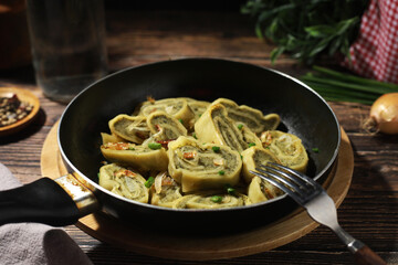 Traditional German Swabian dish maultaschen cut and fried with onion
