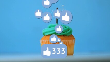 Badge appearing by cupcake candle, thumbs-up icons rising, count updating showing likes to 763