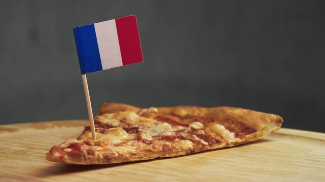 Close up of elegant pizza slice with French flag, frame emphasizes French dairy for aromatic cheese and bakery tradition in thin crust. close-up