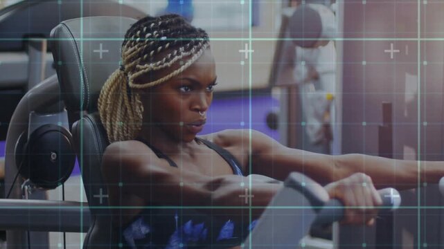 Woman reaching handles and pressing chest press, doing reps for fitness, grid overlay appearing