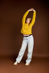 Winter warmth captured in a cozy studio fashion shoot with a redhead