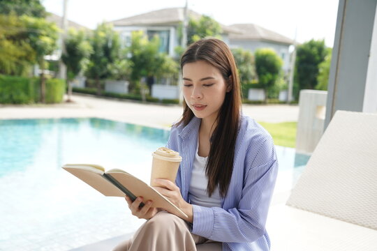 Happy women relaxing together at home outdoor with coffee