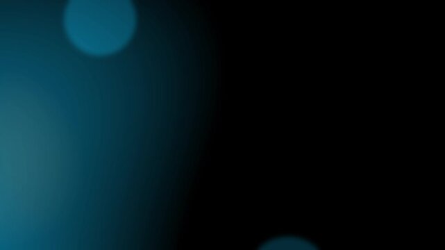 Dark abstract bokeh lights with orange and blue gradient background