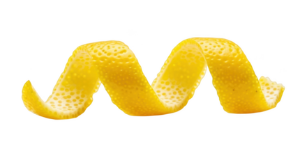 Yellow lemon peel spiral against black background citrus zest twist