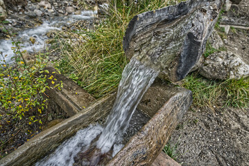 Mountain landscapes, water, and village