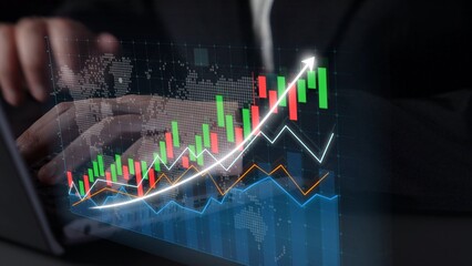A business professional analyzes stock market trends on a laptop, presenting graphic charts that illustrate upward movement, data visualization, and investment opportunities. Copula