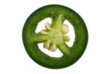 Jalapeño pepper slice displaying internal structure with seeds, a common spicy ingredient in mexican and tex-mex cuisine