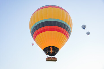 Hot Air Balloon over Cappadocia Valleys in Nevsehir, Turkiye