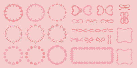 Delicate pink floral wreaths bows and frames arranged on a pastel background