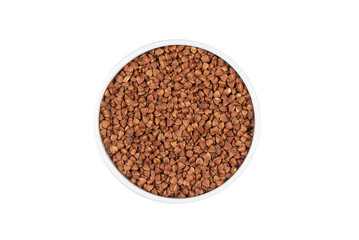 A bowl of brown grains sits on a white background