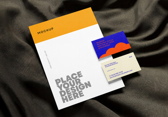Template Mockup Letterhead and Business Card Branding on Fabric Background