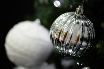 Silver Christmas bauble decorating festive holiday tree