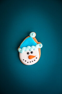 Gingerbread snowman on blue background