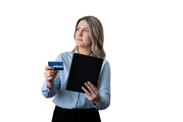 Businesswoman holding credit card and folder, thinking about payment