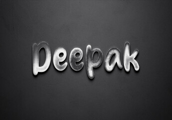 Chrome metal 3D Hindi name design of Deepak on grey background.