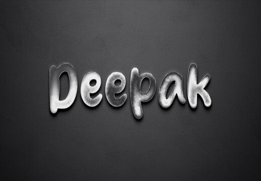 Chrome metal 3D Hindi name design of Deepak on grey background.