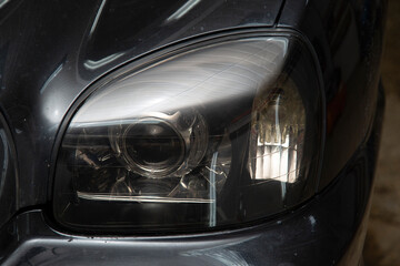 Tinting of the rear headlights of the car.Car design.Detaling center.
