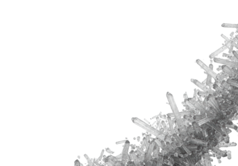 Extreme close-up of microscopic grey crystalline particles scattered diagonally on a transparent background with ample copy space. Abstract macro photography detail. Cold winter texture concept