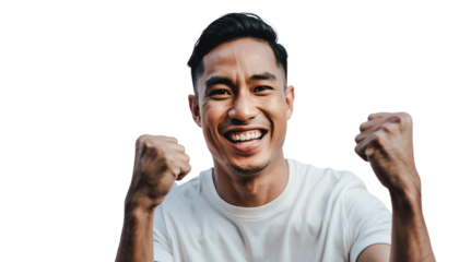 Excited Young Man Cheering with Fists Up, Expressing Success and Happiness