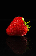 A close up of a red strawberry