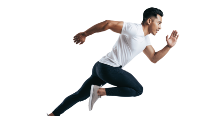Dynamic male athlete running with determination in a side profile studio shot