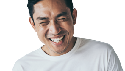 Close-up portrait of a cheerful man laughing heartily with eyes closed, expressing pure joy.