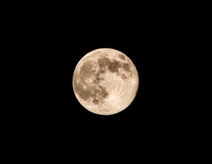 Obraz premium A large, full moon is in the sky
