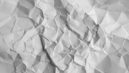 Abstract background texture of highly crumpled white paper with deep wrinkles, creases