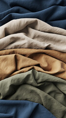Fototapeta premium Folded fabrics in various earthy and calm colors with soft texture.