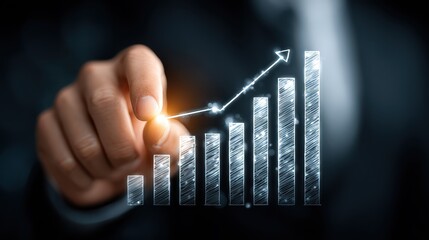 Business professional points at rising chart in dark setting during financial analysis to indicate growth and success in market trends and performance evaluation