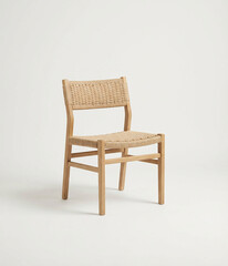 Woven Chair: This image showcases a handcrafted chair, seamlessly blending natural elements with modern design. Its woven seat and backrest invite a sense of relaxation and sophistication.