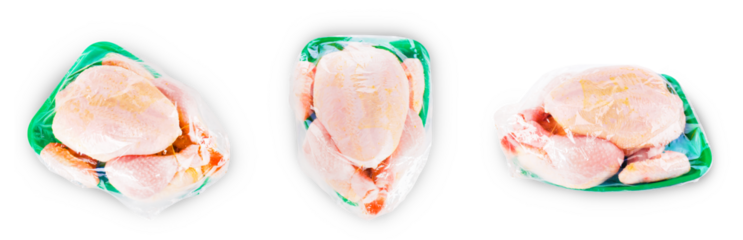 Set of three fresh raw whole chickens in green plastic trays isolated on white background. High quality photo