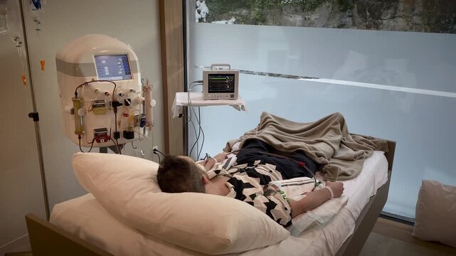 Serene Image Showing Male Patient Calmly Receiving Nighttime Medical Infusion With Gentle Monitoring
