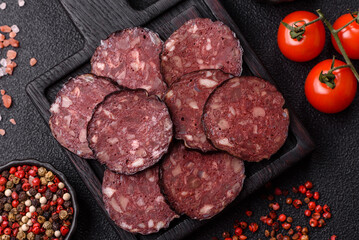 Black blood pudding, grilled pork sausage cooked for dinner. Blood pudding