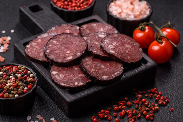 Black blood pudding, grilled pork sausage cooked for dinner. Blood pudding